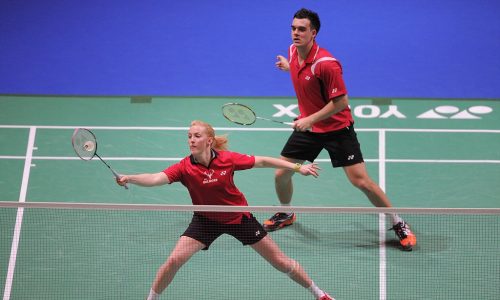 BIRMINGHAM, ENGLAND - MARCH 09:  Chris Adcock of England and Imogen Bankier (L) of Scotland in action during their mixed doubles match against Peng Soon Chan and Liu Ying Goh of Malaysia during the Yonex All England Badminton Open Championship at the NIA on March 9, 2012 in Birmingham, England.  (Photo by Michael Regan/Getty Images)