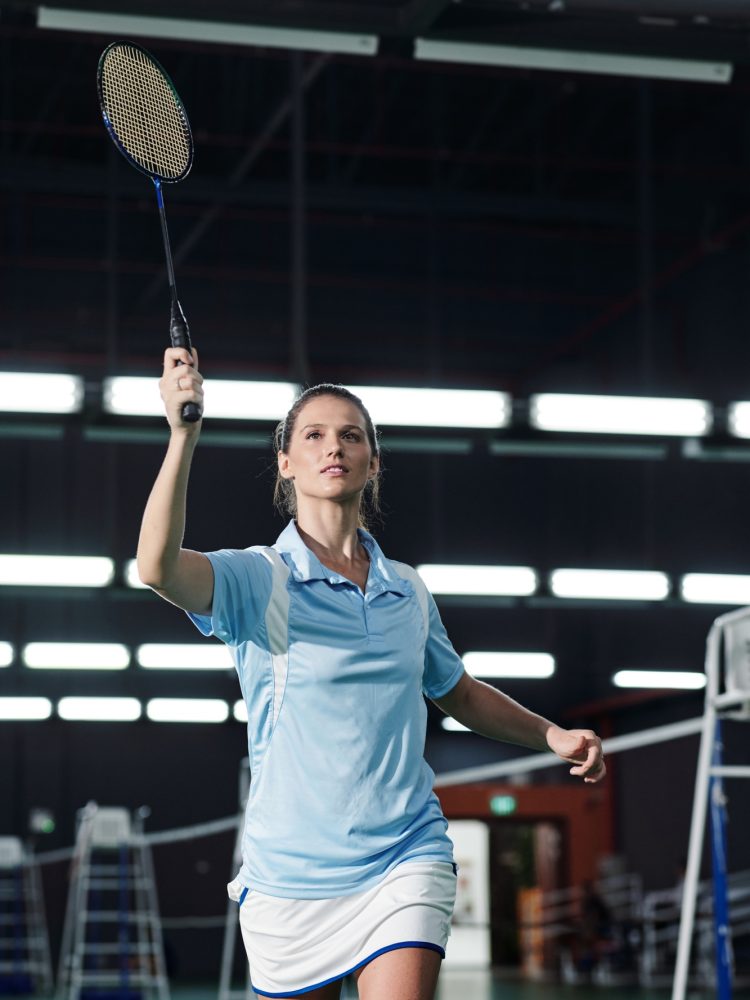 Sportswoman Playing Badminton